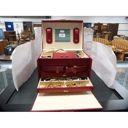 199 - Jewellery box containing a large quantity of costume jewellery to include earrings, bracelets, chain... 