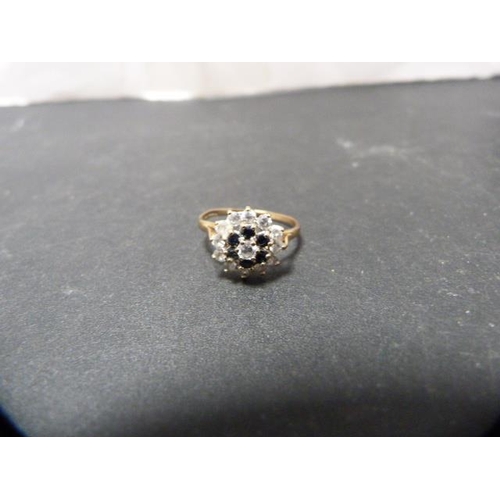 204 - 9ct gold cluster ring set with faux gemstones, 1.95g gross.