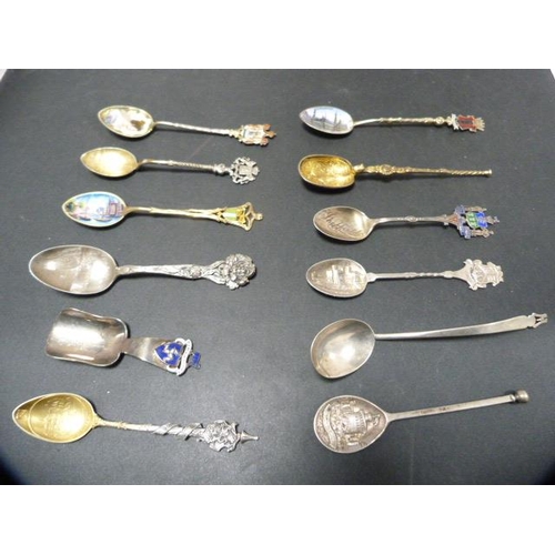 221 - Group of silver and silver gilt souvenir spoons to include continental examples, some marked 'silver... 