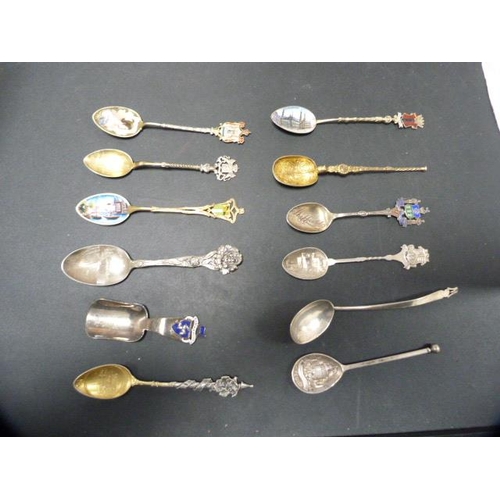 221 - Group of silver and silver gilt souvenir spoons to include continental examples, some marked 'silver... 