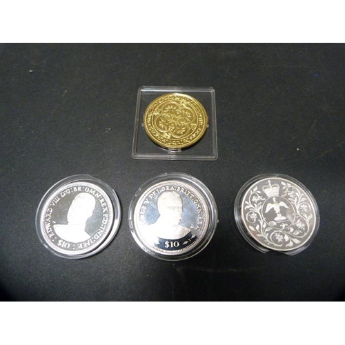 229 - Two proof Queen Elizabeth II British Virgin Islands ten dollar coins, 2006, an Elizabeth II 1977 coi... 