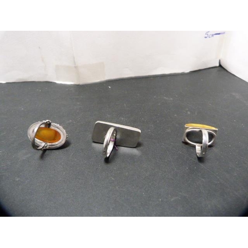 238 - Modern silver-mounted jewellery to include three rings set with faux amber and faux citrine stones, ... 