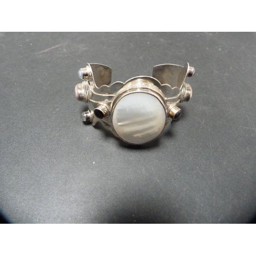 240 - Modern silver bracelet set with gem-style cabochons and a mother of pearl cabochon stone, 78.4g gros... 