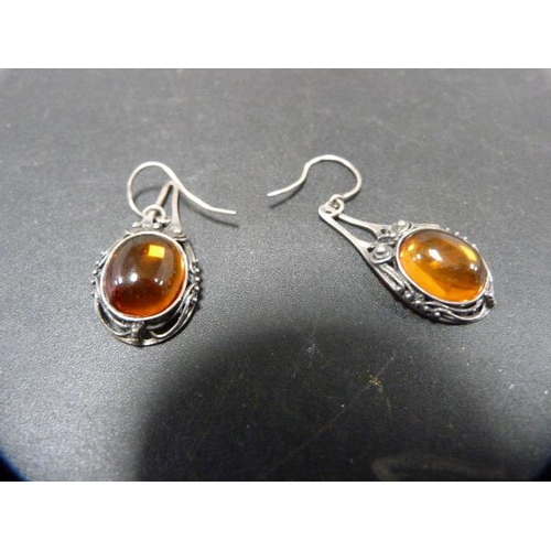 242 - Silver bracelet with matching earrings set with faux amber stones, and a similar pair of silver-moun... 