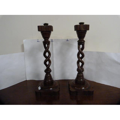 263 - Coopered barrel planter and a pair of oak candlesticks.  (3)