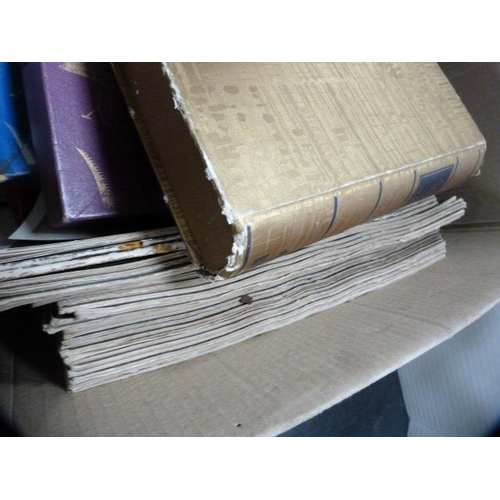 265 - Carton containing a stamp album, art magazines, jigsaws, cutlery case etc.