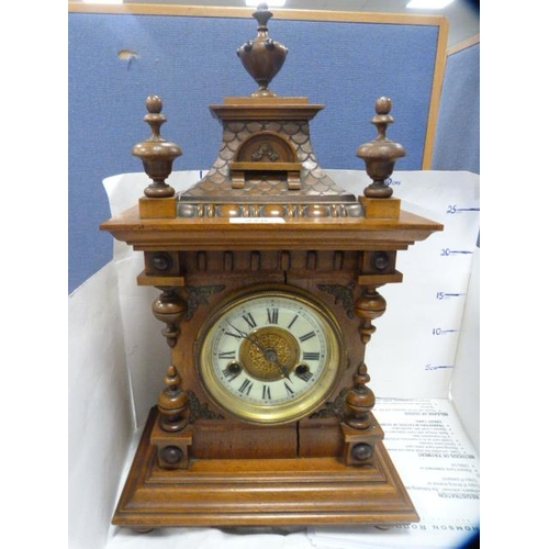 278 - German walnut-cased twin train mantel clock.