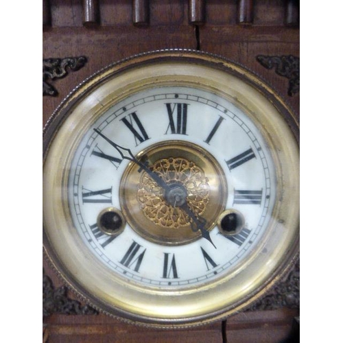 278 - German walnut-cased twin train mantel clock.