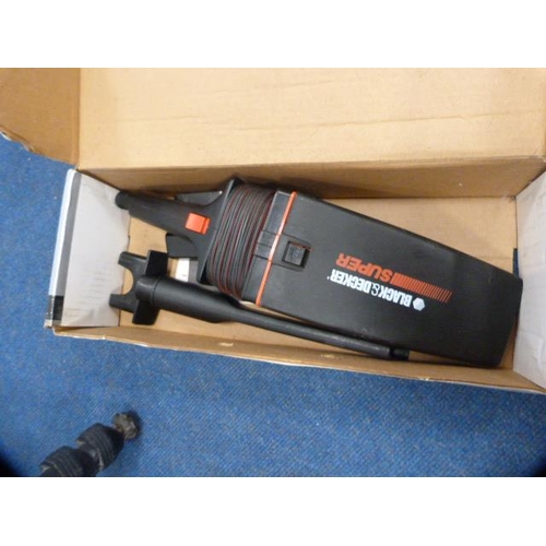 285 - Boxed Black & Decker Carvac Super, and a camera tripod.  (2)