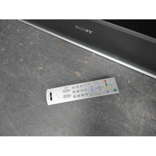 294 - Sony Bravia television with remote control.