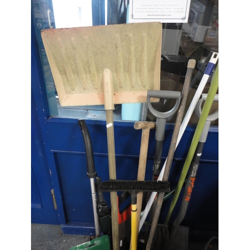 295 - Group of garden tools to include a Qualcast lawnmower, spade, strimmer, sprayer etc.