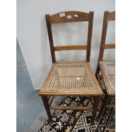 297 - Pair of Arts & Crafts parlour chairs and a pair of Vintage spindle-back chairs in the manner of ... 