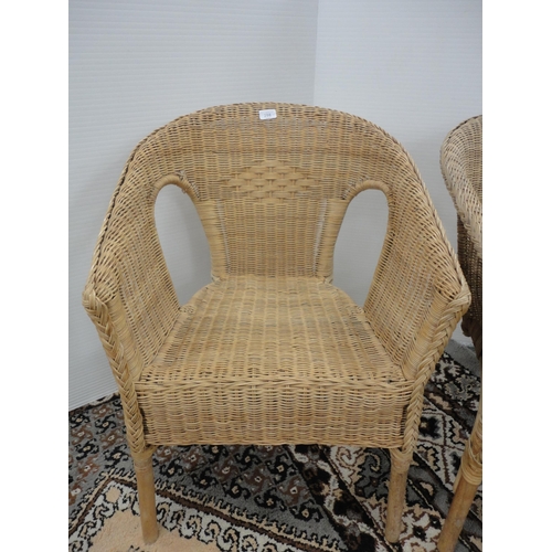 298 - Pair of wicker pavilion-style chairs.  (2)