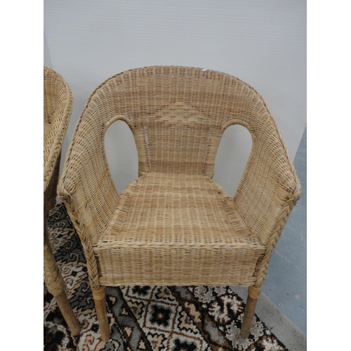 298 - Pair of wicker pavilion-style chairs.  (2)