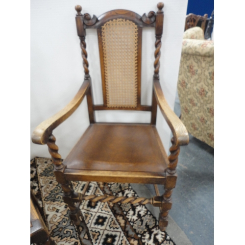 299 - Set of six oak dining chairs with bergère back rests, including a pair of carvers.  (6)