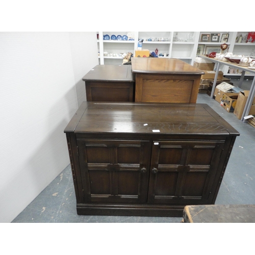 301 - Priory-style two-door cupboard, another Priory-style cupboard and an Ercol-style television cabinet.... 