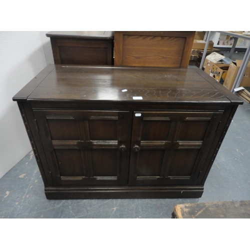 301 - Priory-style two-door cupboard, another Priory-style cupboard and an Ercol-style television cabinet.... 