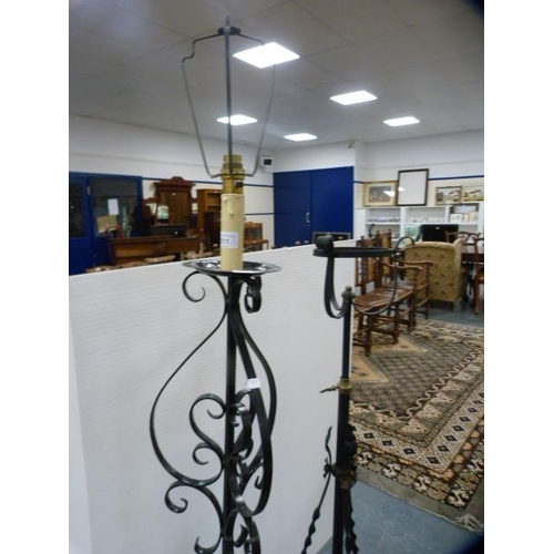 311 - Art Nouveau-style metal adjustable floor lamp and a similar example.  (2)
