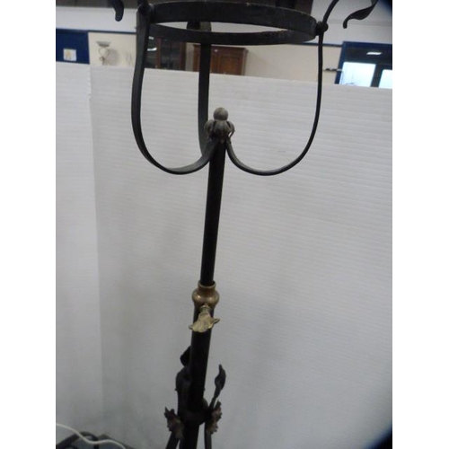 311 - Art Nouveau-style metal adjustable floor lamp and a similar example.  (2)