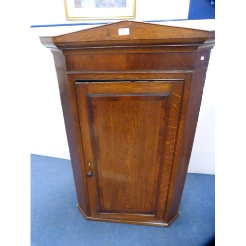 329 - Antique oak corner cupboard.