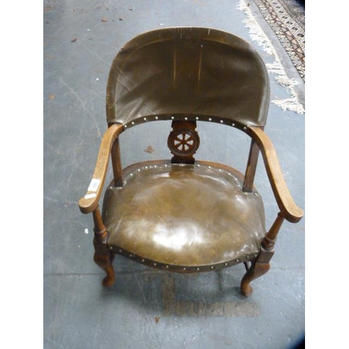 336 - Arts & Crafts-style oak parlour armchair, upholstered in later Rexine.