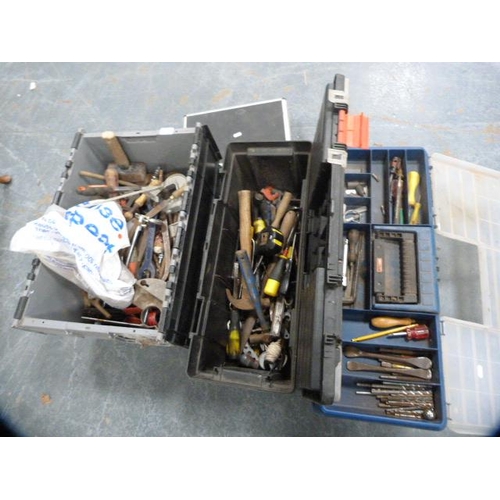 337 - Toolboxes and boxes containing a large quantity of tools to include pipe cutter, levels, hammers, sa... 