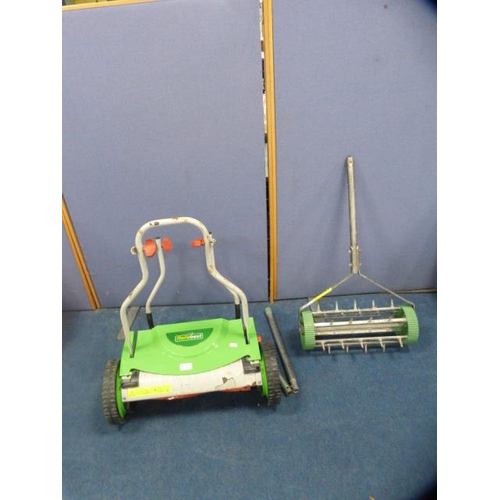 339 - Florabest lawnmower and a lawn aerator.  (2)