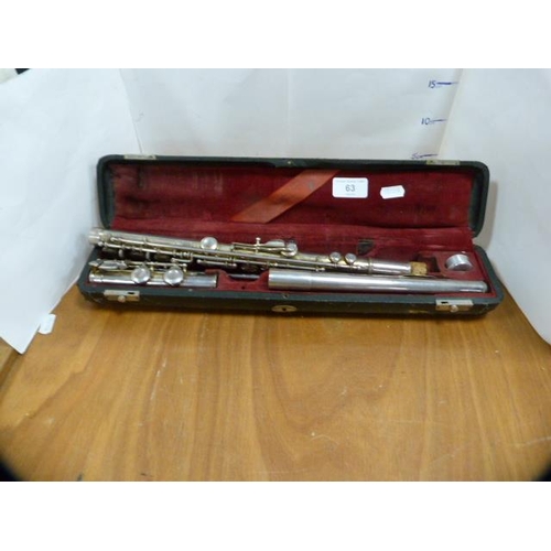 63 - Kohlert flute, in fitted case.