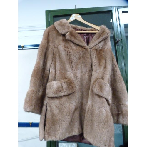 83 - Lady's fur coat.