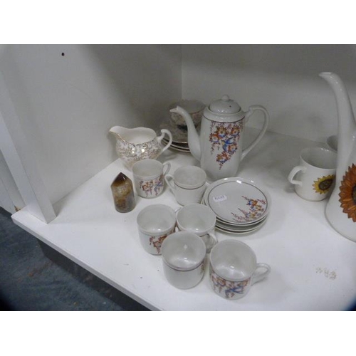 86 - Studio pottery part coffee set, Paragon part tea set etc (one shelf).