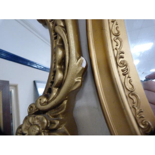 99 - Two reproduction wall mirrors, one in the Victorian style.