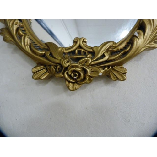 99 - Two reproduction wall mirrors, one in the Victorian style.