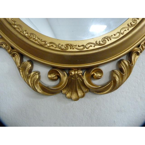 99 - Two reproduction wall mirrors, one in the Victorian style.