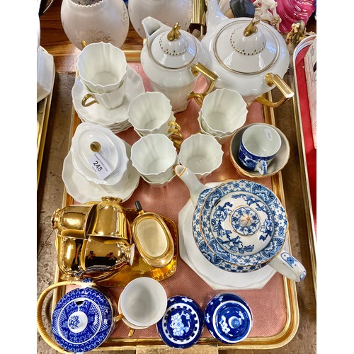 248 - Wedgewood gilt decorated tea set , gilt coffee set, prunus blossom ginger jars etc.