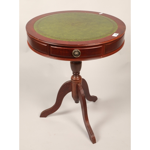 530 - Leather topped drum table with fitted drawers 61 x 50 cm