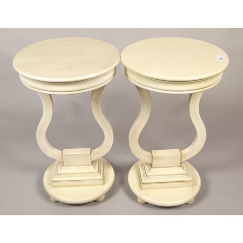 552 - Pair of cream occasional tables, 59 cm high (2)