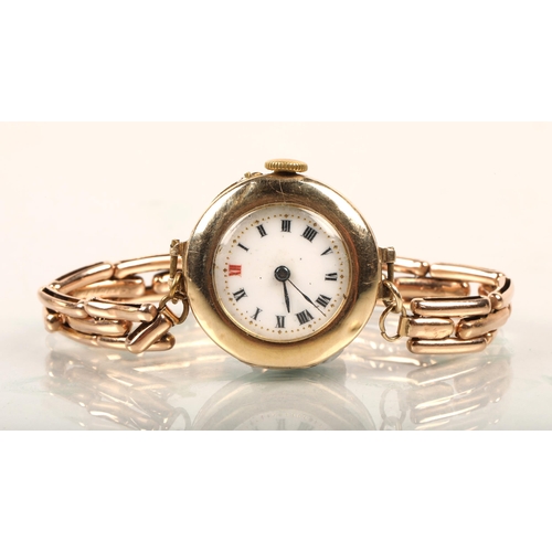 107 - 9 ct Ladies wristwatch, with rolled gold bracelet strap