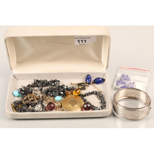 111 - Box of costume jewellery to include necklaces, bangle etc