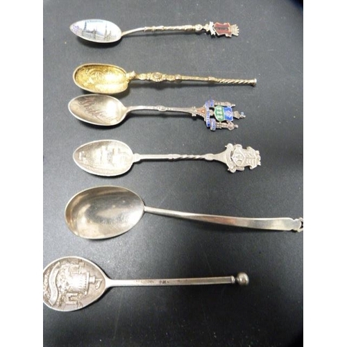 221 - Group of silver and silver gilt souvenir spoons to include continental examples, some marked 'silver... 