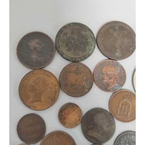 328 - Collection of British and World coins to include a 1680s William & Mary halfpenny, a 1793 Middlesex ... 