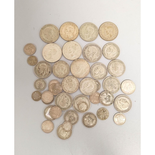 329 - United Kingdom. Large collection of .500 grade silver coins to include shillings, halfcrowns, sixpen... 