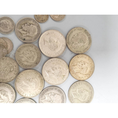 329 - United Kingdom. Large collection of .500 grade silver coins to include shillings, halfcrowns, sixpen... 