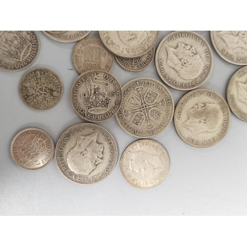 329 - United Kingdom. Large collection of .500 grade silver coins to include shillings, halfcrowns, sixpen... 