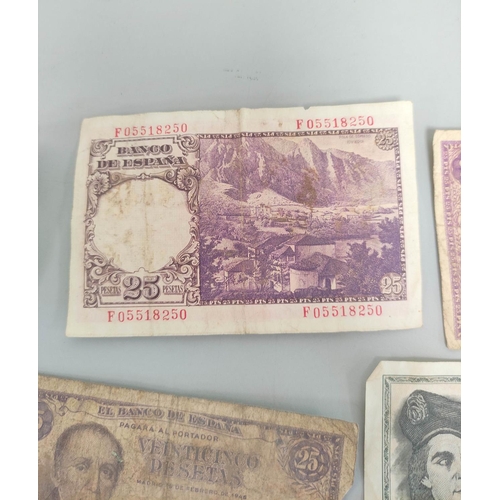 343 - Group of world banknotes to include a Portuguese 1947 50 escudos serial number DDP 17085, four Spani... 