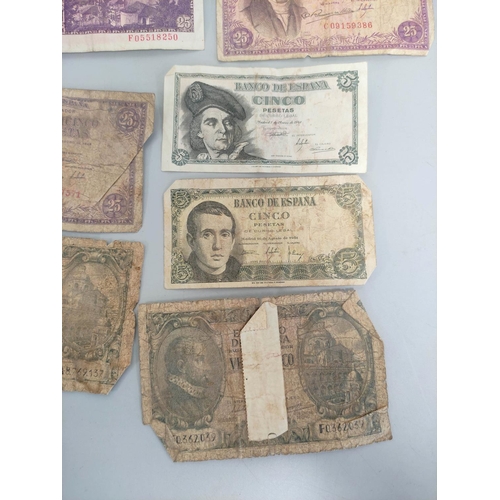 343 - Group of world banknotes to include a Portuguese 1947 50 escudos serial number DDP 17085, four Spani... 