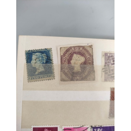 391 - Album of British and World stamps to include a GB 1854 embossed six pence stamp.