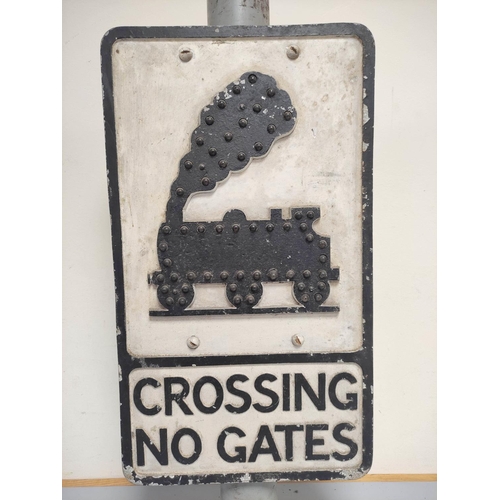 429 - Motoring / Railway Interest. Black and white painted cast aluminium road sign ''Crossing No Gates'' ... 