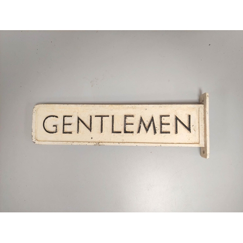 431 - Railway station cast aluminium double sided black and white painted sign ''Gentlemen''. 34cm x 8cm 