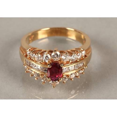 103 - Ladies 14 k gold Ruby and Diamond ring, Central ruby flanked by four square cut diamonds either side... 