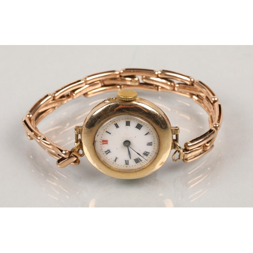 107 - 9 ct Ladies wristwatch, with rolled gold bracelet strap